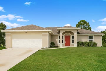 124 GILBERT AVE S LEHIGH ACRES, FL 33973